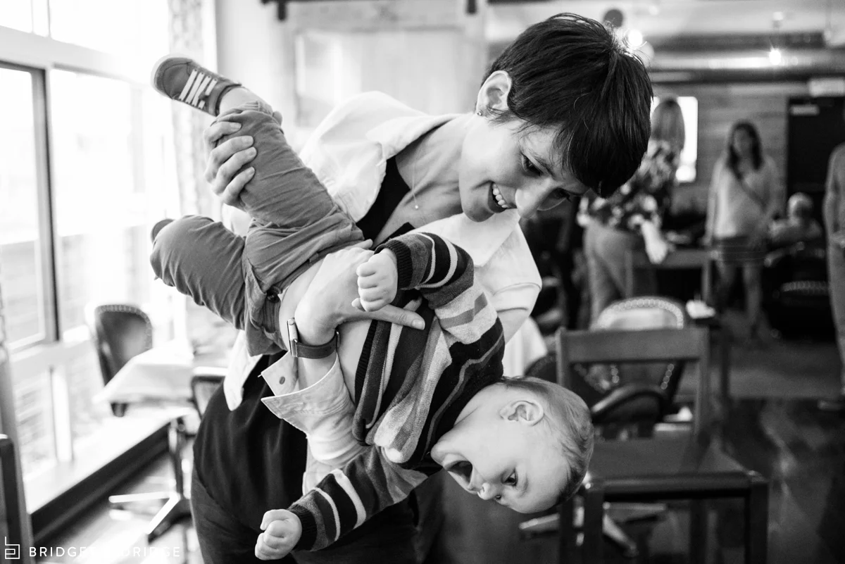 mom plays with her son at his 1st birthday party in alexandria va