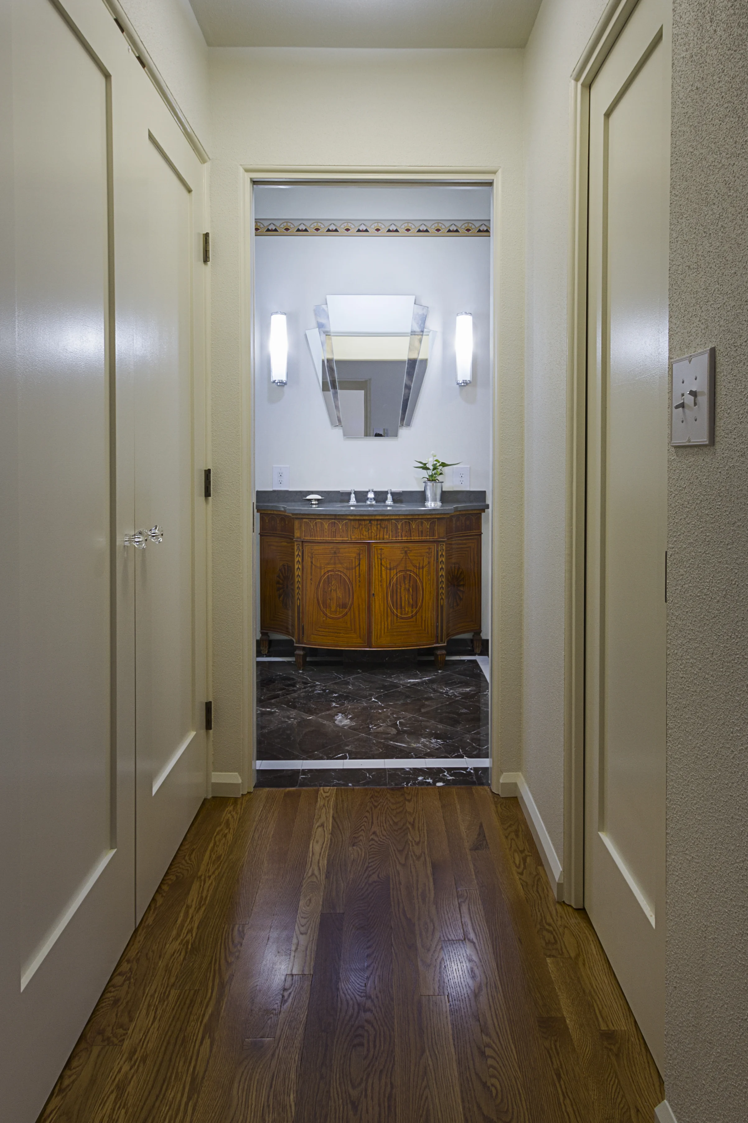 The Master Bathroom is located at the end of this short Hallway, off the Master Bedroom. To the left is the Laundry Closet, to the right is the Master Closet.
