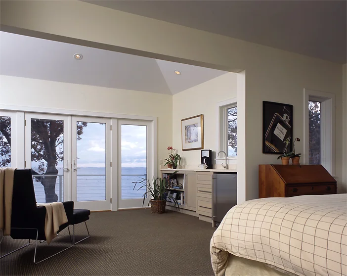 The new second floor provided a large Master Bedroom Suite, with a sitting area overlooking the ocean.