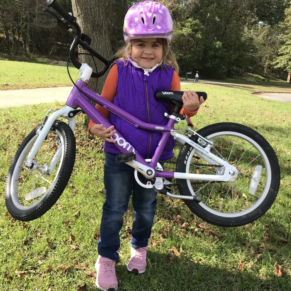 Purple Girl Purple Woom Bike.jpeg
