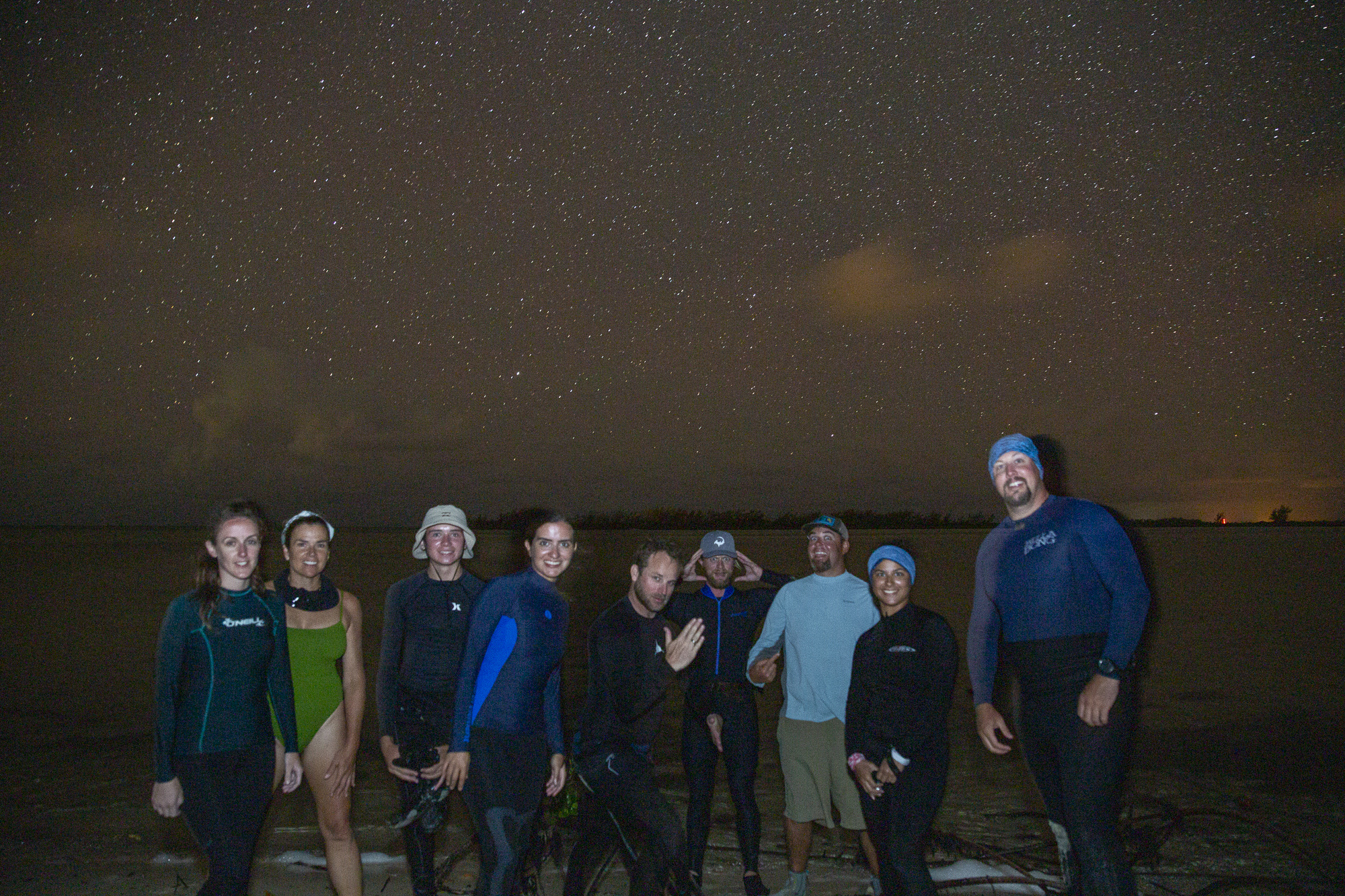 In between checks the team took a group photo under the incredible sky and enjoyed a few laughs and snacks.