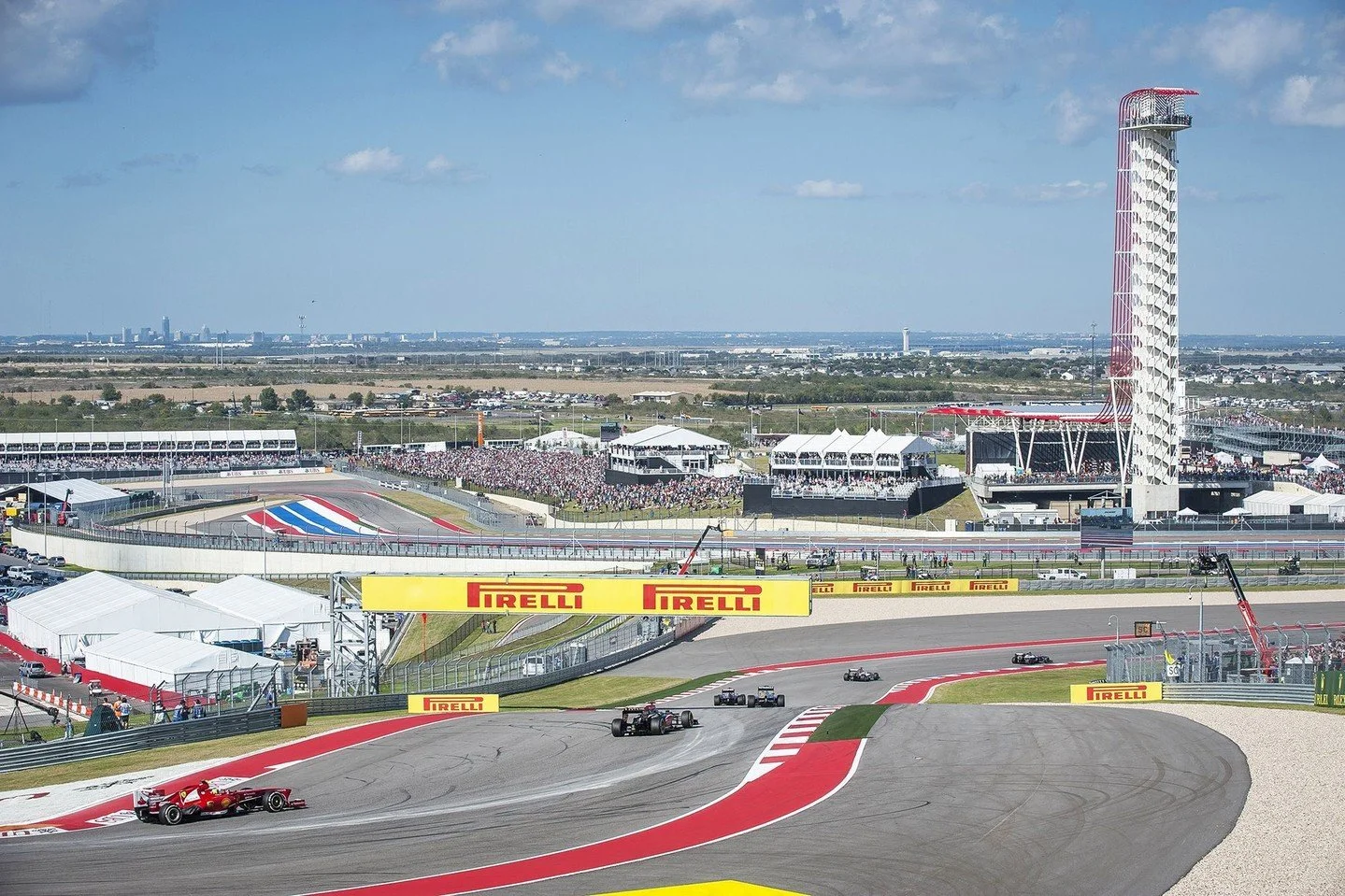 Like Formula One racecars, the form of the Observation Tower is directly influenced by its performance. The primary structure surrounding the elevator core consists of a diagrid of vertical and diagonal steel tubes that wraps a pair of continuously w