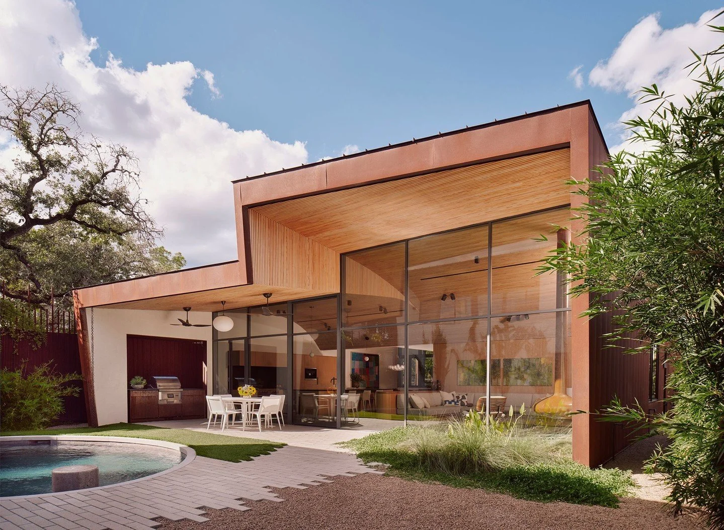 A large sliding door allows the main living areas to be opened up to a covered patio, whose deep overhang provides ample refuge from the sun. #Residence1401 #MiroRiveraArchitects #MRAProjectoftheWeek 🔨 @lvlonthelvl 📷 @caseycdunn