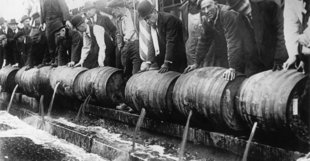 Barrels of beer emptied into the sewer by authorities during prohibition in America.