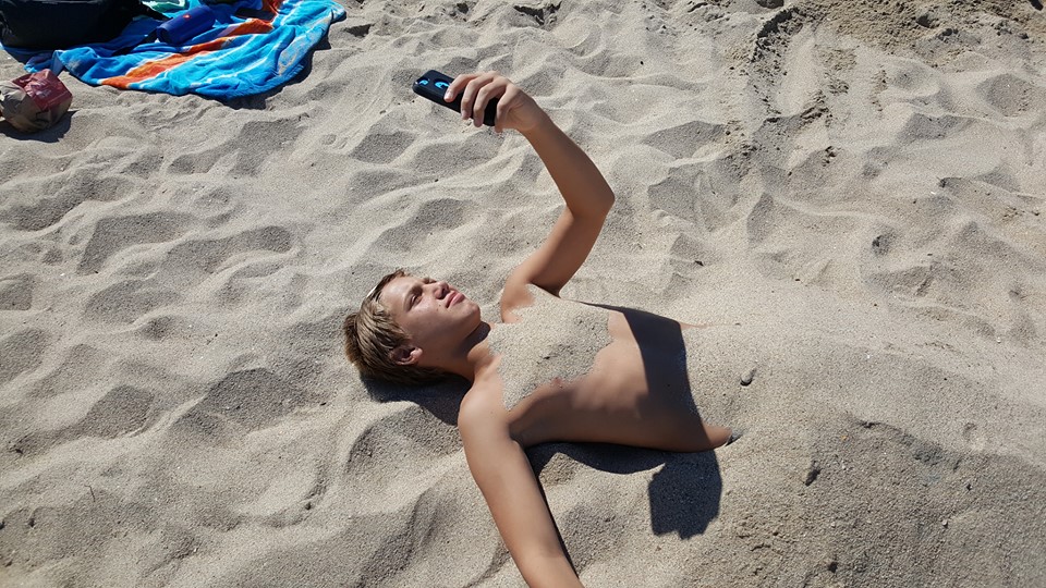 phone and sand teen.jpg