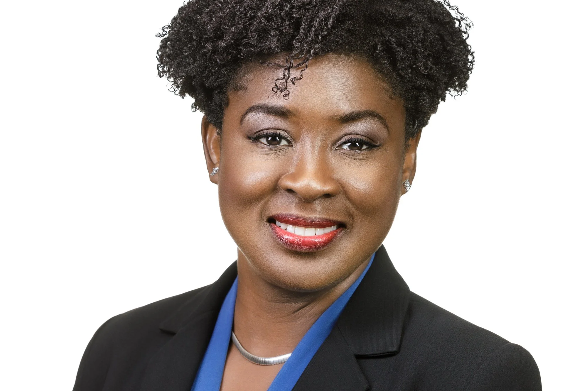 Smiling woman in a business suit.