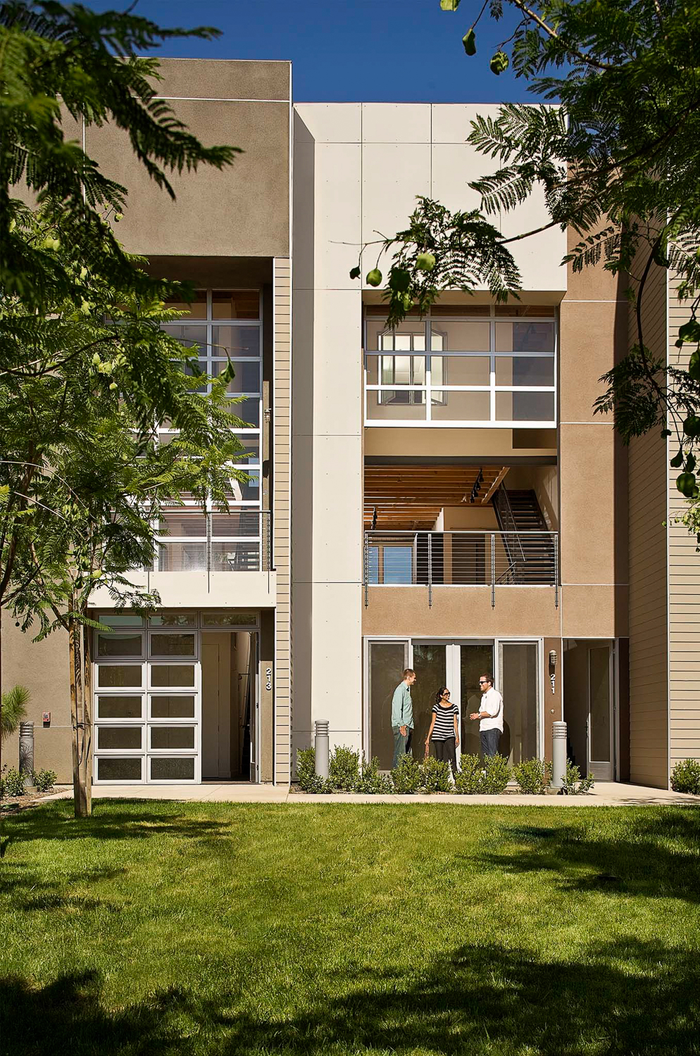 City Place Live-Work Lofts in Santa Ana, CA. Daylight exterior photo with strobe lit interior. Photographed for Steven Ehrlich Architects.