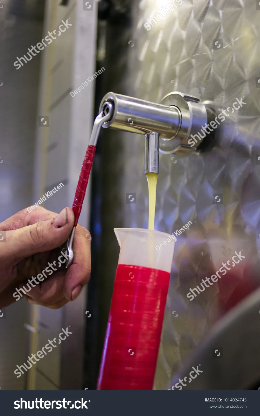 stock-photo-close-up-view-of-a-hydrometer-used-while-testing-the-sugar-in-wine-1014024745.jpg
