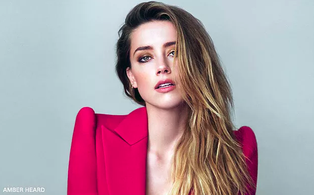 Amber Heard reaches out to 'silent sisters'