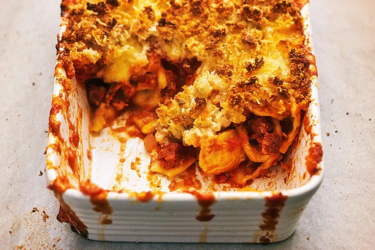 Chorizo pasta bake recipe a fork and a pencil