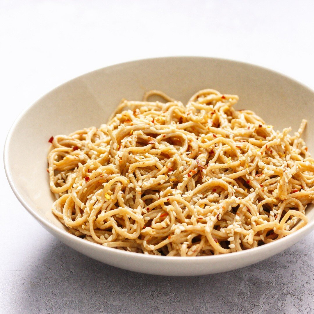 Peanut and sesame udon noodles.

My peanut sauce runs along vaguely Thai lines &ndash; coconut milk, red curry paste, lime juice, a little brown sugar, more heat from chilli flakes &ndash; although my noodle of choice is Japanese because I like the f