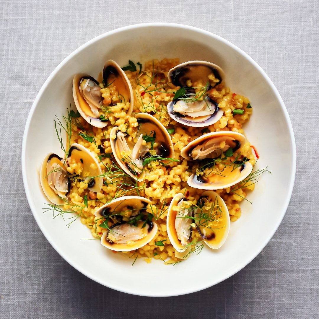 Vongole with fregola sarda, fennel, saffron and lemon.

I found these vongole at the market this morning, so had to have them. They&rsquo;re from Coffin Bay, South Australia &ndash; famous for its oysters, they call these little clams &ldquo;the whit