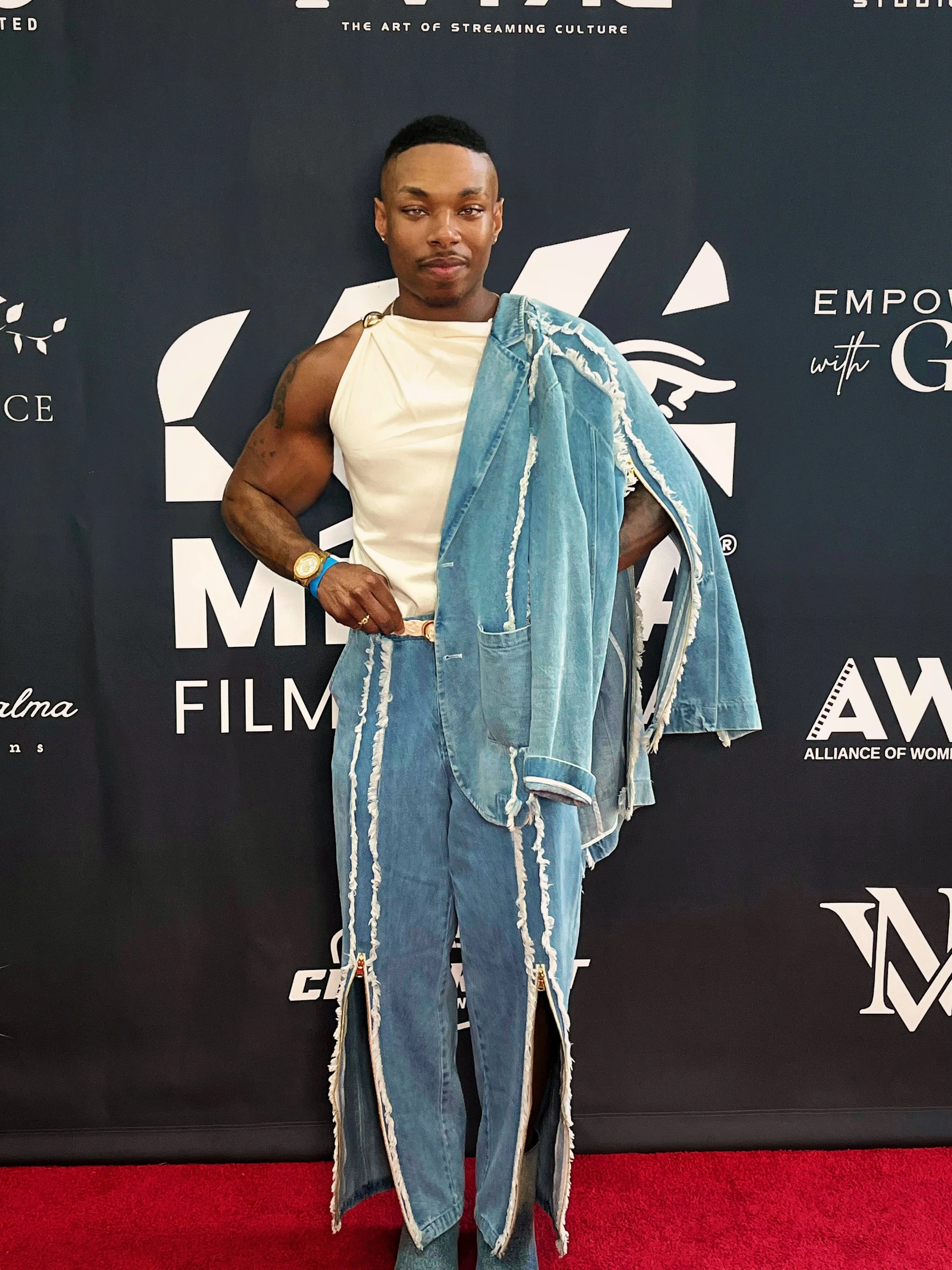 Tré Melvin MiraLA Film Festival red carpet denim look