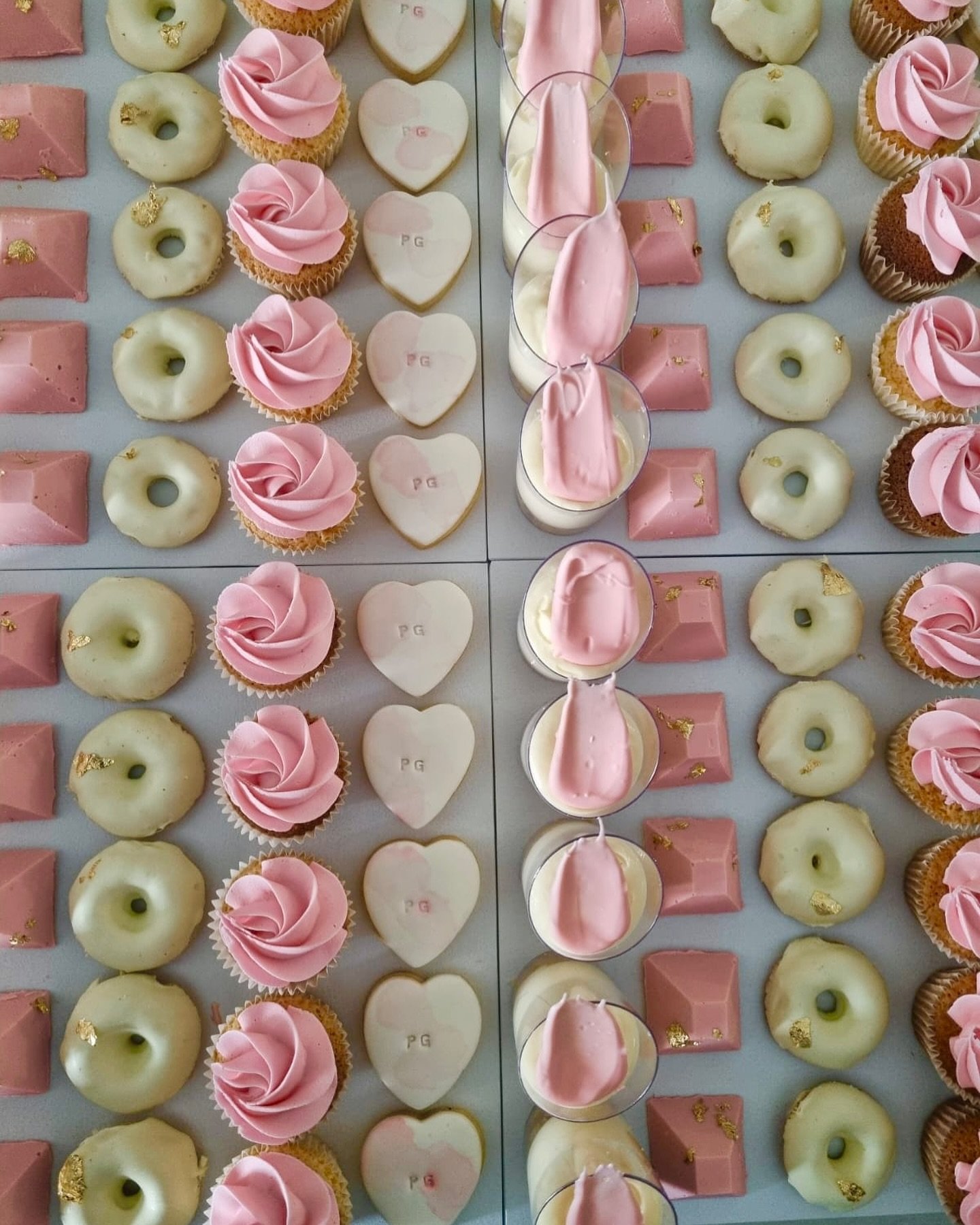 Pretty in pink, and perfectly curated 💕
Every element on this partyboard is made to wow - from silky dessert cups and gold-kissed donuts to delicate rose cupcakes and stamped heart cookies.

Designed for moments worth celebrating ✨
Bridal shower? Ba