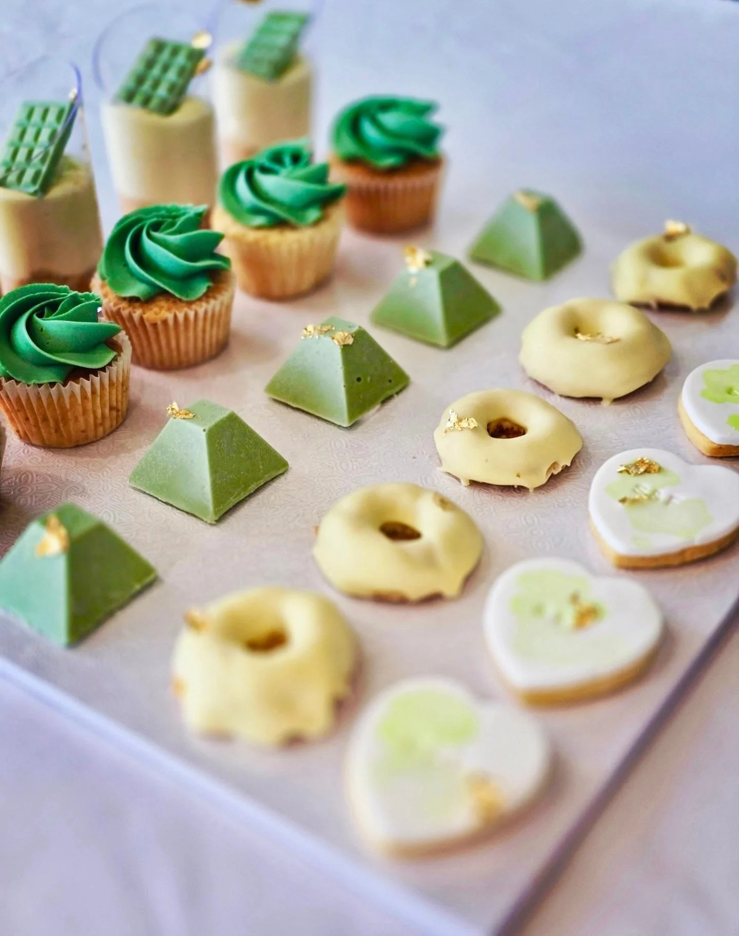 ✨ Party perfection on a board! ✨

Our dessert spread is serving all the sweet vibes &ndash; creamy cheesecake cups, fluffy cupcakes, golden donuts, luxe pyramid bites, and delicate heart cookies with a touch of gold 💚🤍💛

Because every celebration 