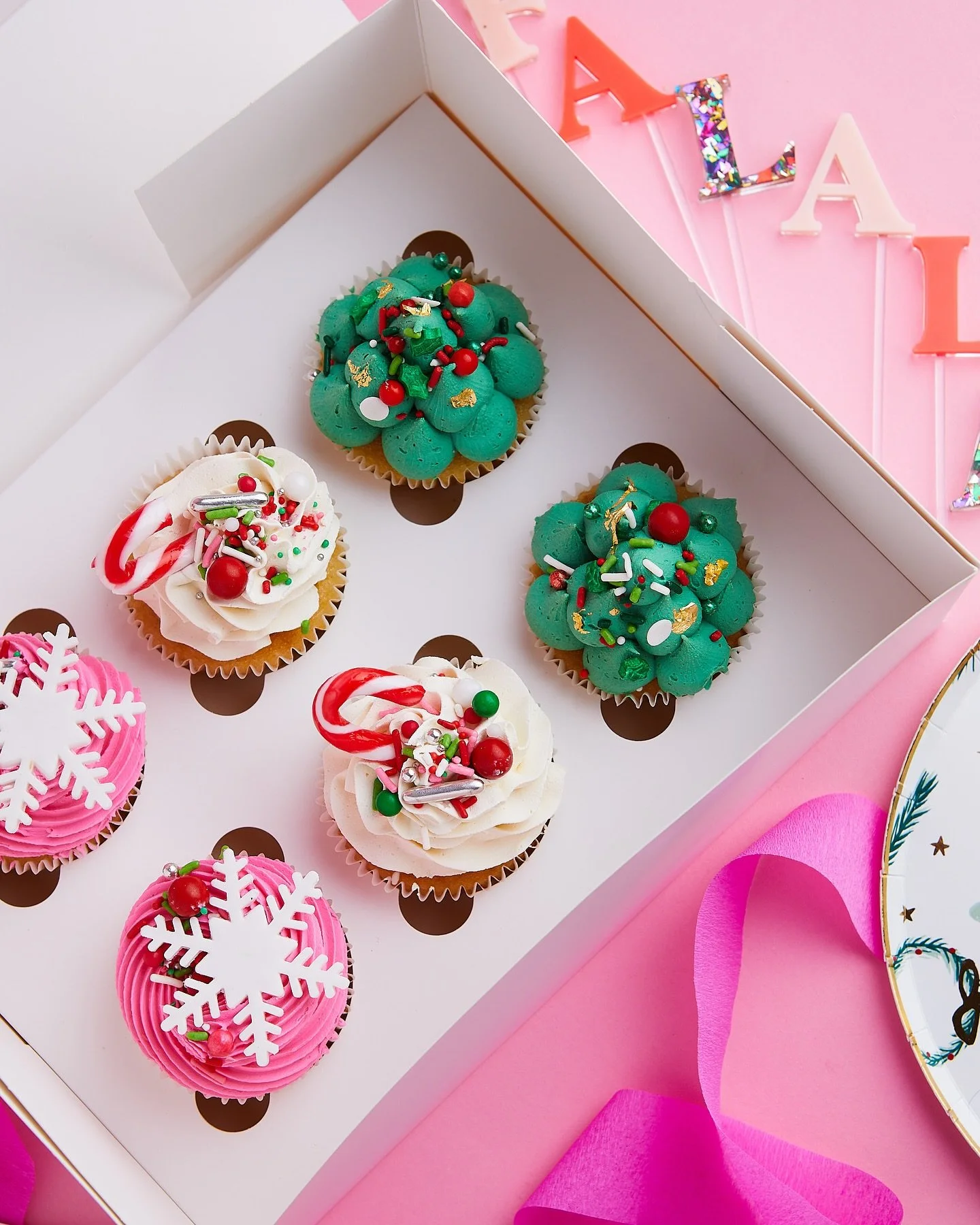 🎄Santa called &mdash; he wants our cupcakes for himself this year. Sorry elves, you&rsquo;re getting crumbs 😏💋

Pink, green &amp; candy-cane dreams &mdash; which one&rsquo;s your fave? 💚💗❤️ Shop online to pre-order!

 #ChristmasCupcakes #Christm