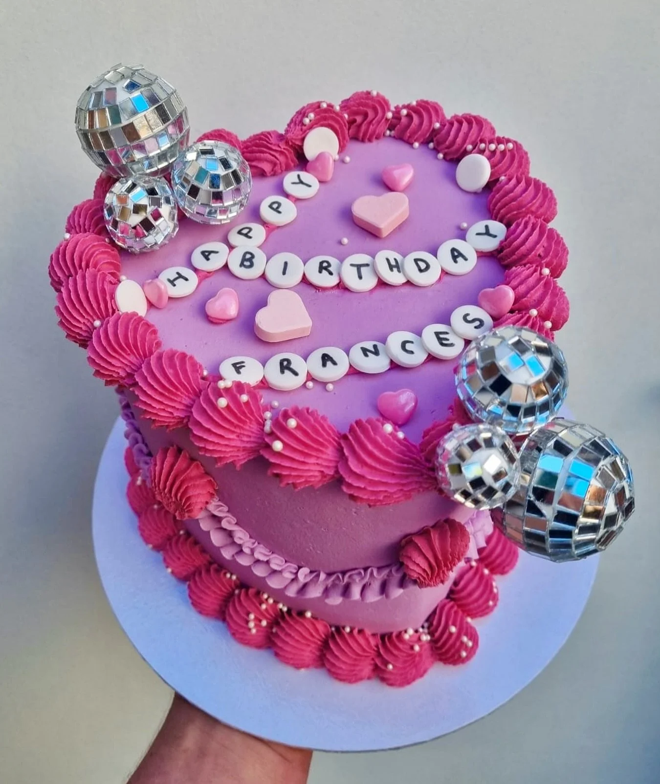 💖✨ disco dreams + pink frosting scenes ✨💖

we&rsquo;re living our main character era with this heart-shaped cutie 💅💞
mirror balls, piped perfection, and all the birthday energy 🪩🎂💋

tag your bestie who&rsquo;d totally claim this as her cake 👑