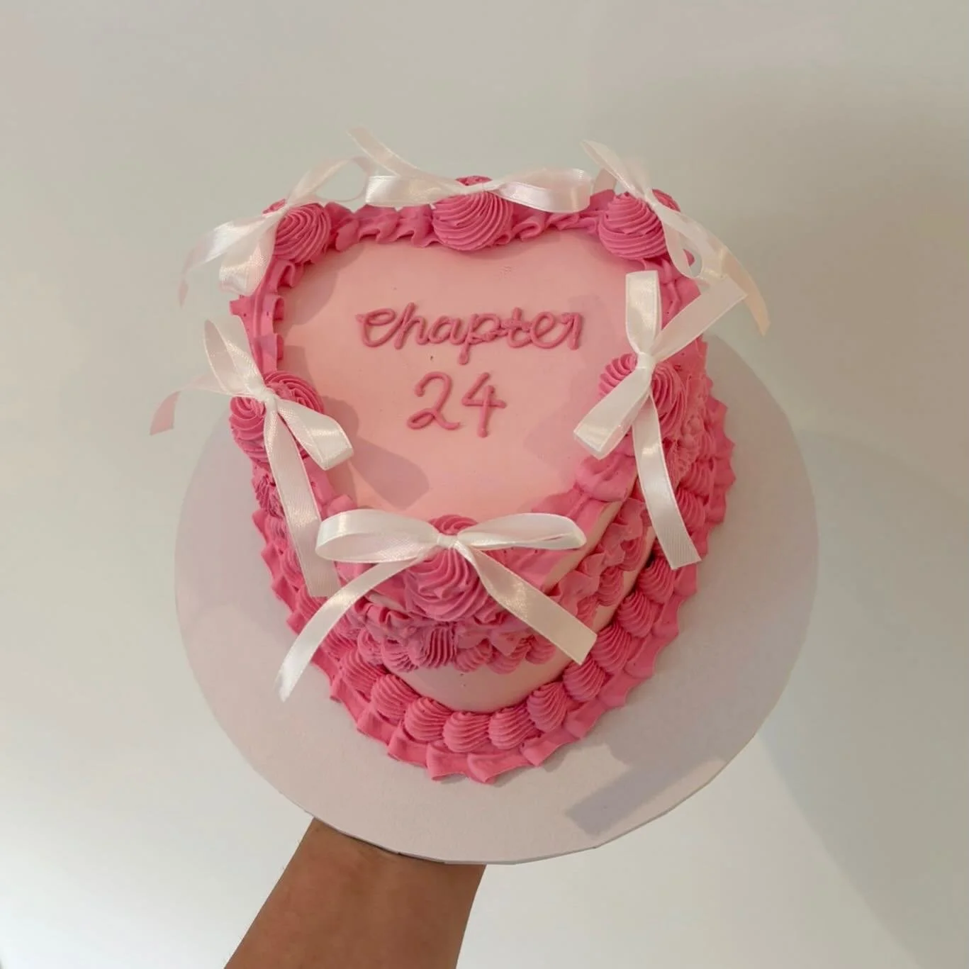 🎀 In my Bow Era 🎀
Say hello to this dreamy heart cake, dressed in pretty pink buttercream and finished with dainty bows - because everything is better with a little ribbon magic 💗✨

Perfect for birthdays, milestones, or just because you&rsquo;re f