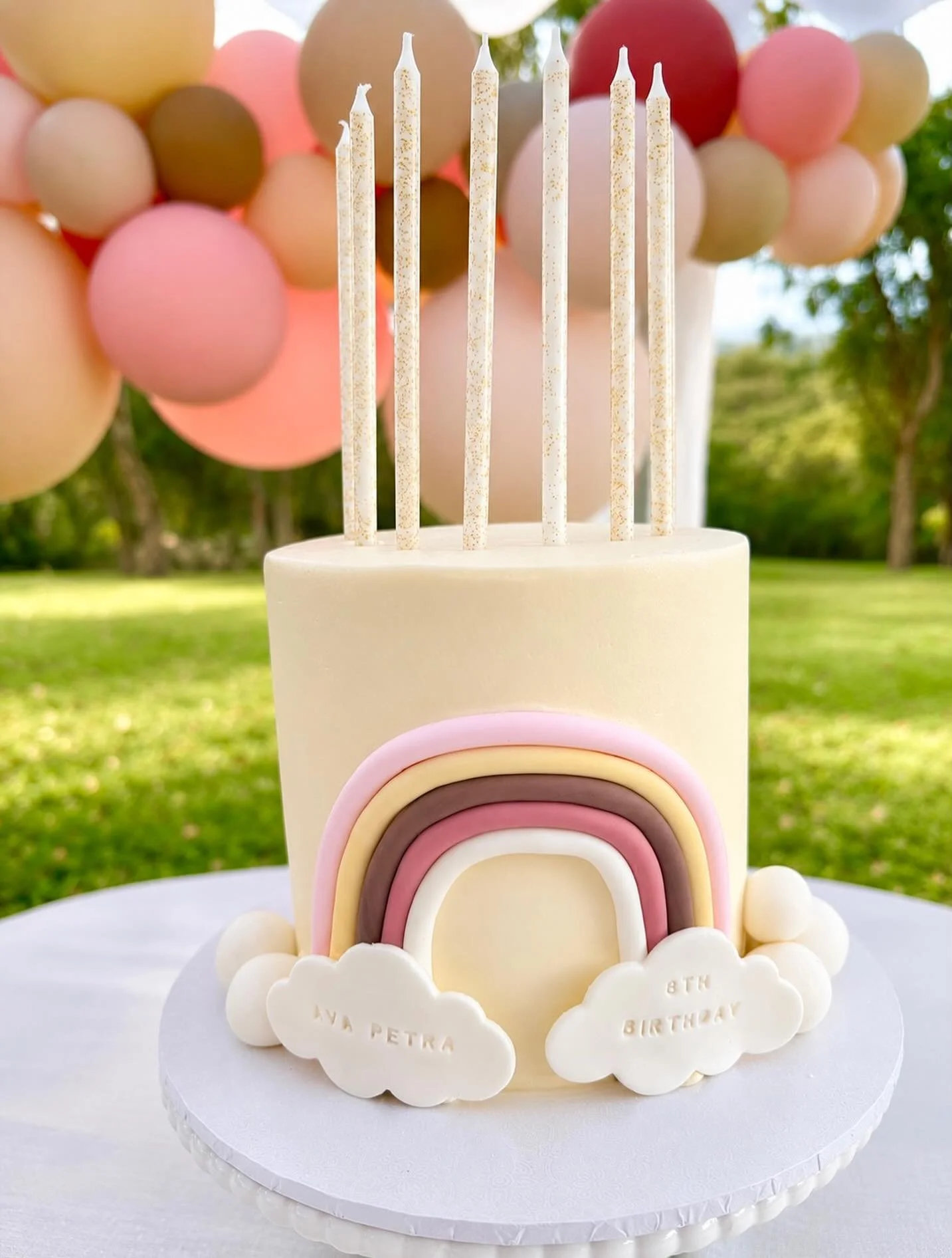 ✨ There&rsquo;s something so timeless about a rainbow cake&hellip; soft, elegant and full of joy. 🌈🤍

We absolutely loved creating this dreamy design for Ava Petra&rsquo;s 8th birthday, finished with personalised fondant details and topped with the