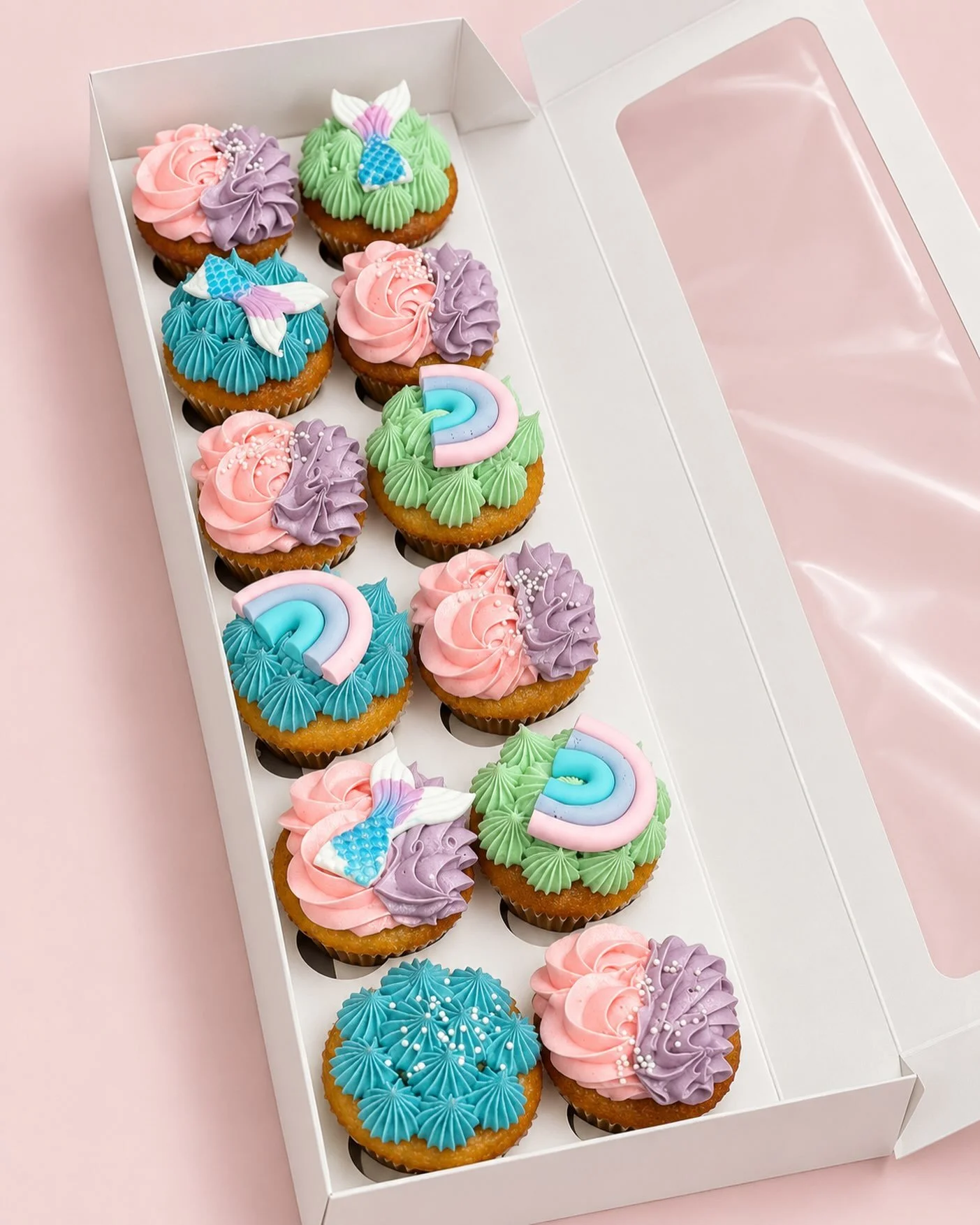 Mermaid magic &amp; pastel dreams 🧜&zwj;♀️🩷🩵✨ The sweetest little cupcakes, finished with pretty swirls, rainbows and mermaid tails!

The perfect touch for a little mermaid celebration 💕🧁

#CustomCupcakesMelbourne #MelbourneCakes #MermaidCupcake