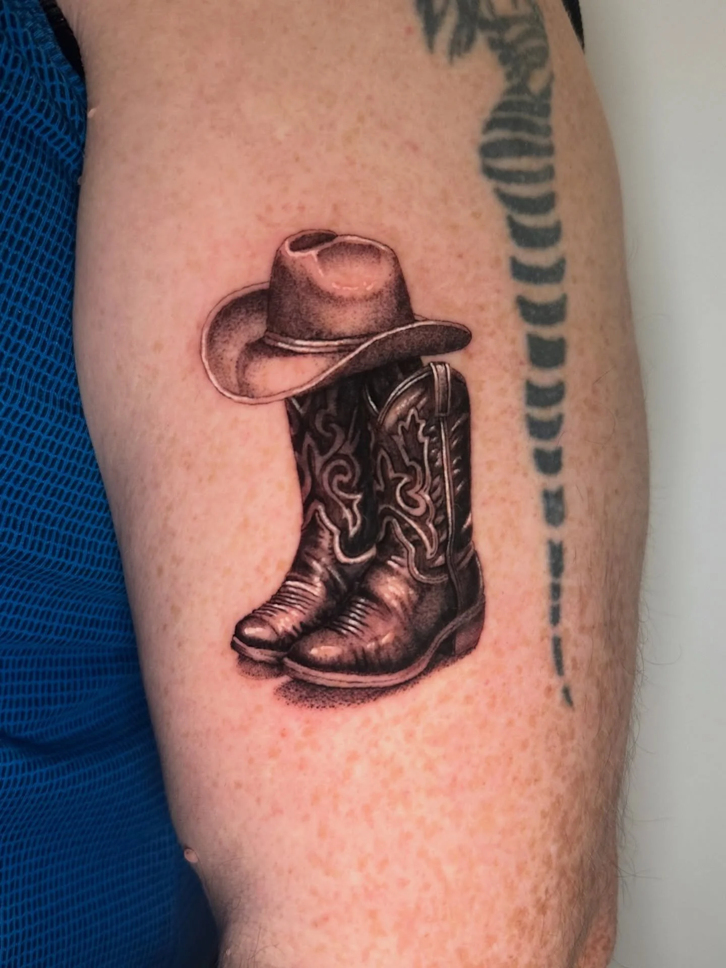 Hats off to Jim! These boots were made for inking! 🤠👢
Really fun tattooing these small but detailed cowboy boots! Super happy with how they came out! 
Would love to try out some more micro realism stuff! 
Dm myself or @sandsoftimetattoo to book in!