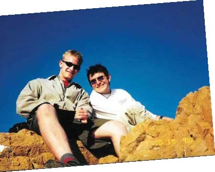 Aaron Shaffer (’01) and Alex Fraser (’01 and ’10) bask in the sunshine in Greece during their Semester in Europe trip that they took in the fall of 2000.
