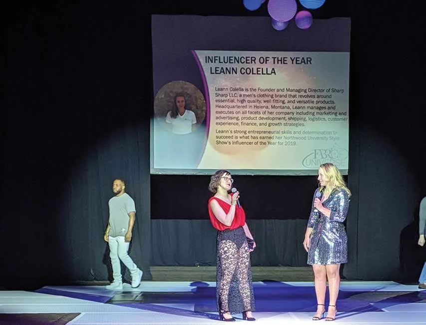 Style Show Chairwoman Emily Williams (’19) presents the first Influencer of the Year award to Leann Colella (’17), founder and managing director of Sharp Spruce.