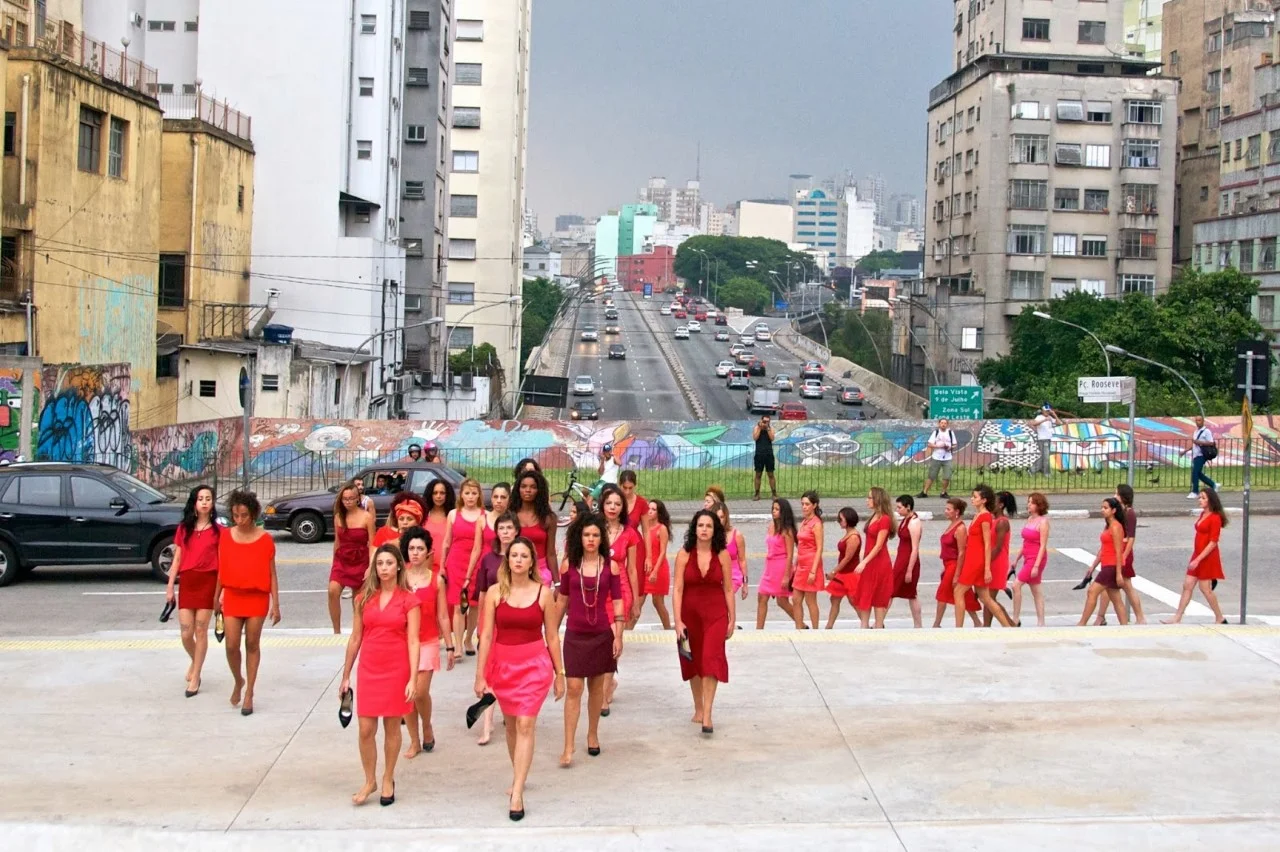 Sandler argues that installations or performances in São Paulo activate public space through actions that create spaces of dissent and encode political meaning in the city. Here, the Colectivo PI (Pi Collective) performs "Entre Saltos” (On High Heels) , directed by artists Priscilla Toscano and Pâmella Cruz, São Paulo, 2013. The piece calls attention to the impossibility of maintaining all the identities put upon women—homemaker, mother, professional, and object of desire. Courtesy of Eduardo Bernardino.