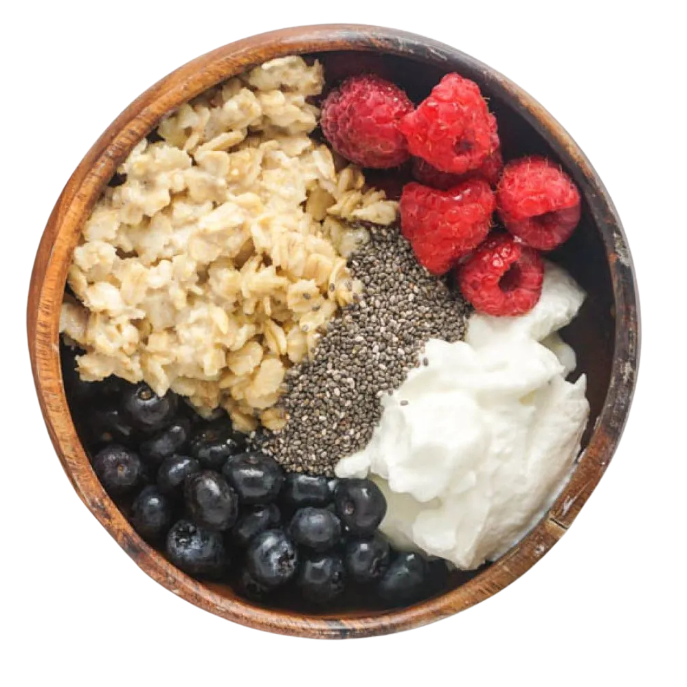 Bowl of fruit, yoghurt, berries, chia seeds and oats.
