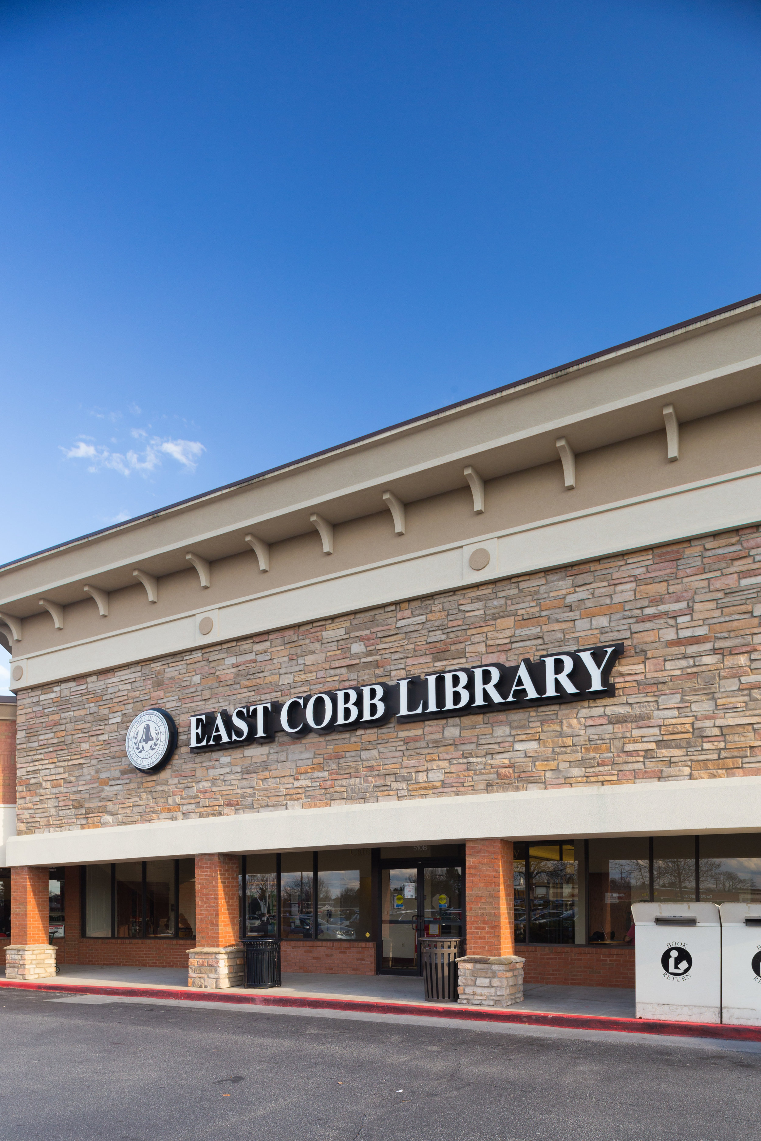 The exterior storefront of the East Cobb Library at Parkaire Landing