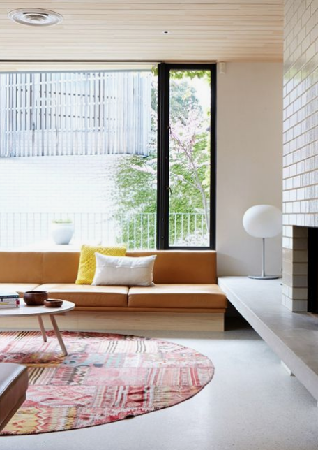 I know I said no bright colors but the styling of this space really makes me happy and the patchwork kilim really brings it to life.