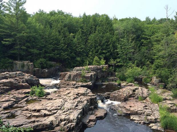 View of the rock formations and whitewater river at the Eau Claire Dells