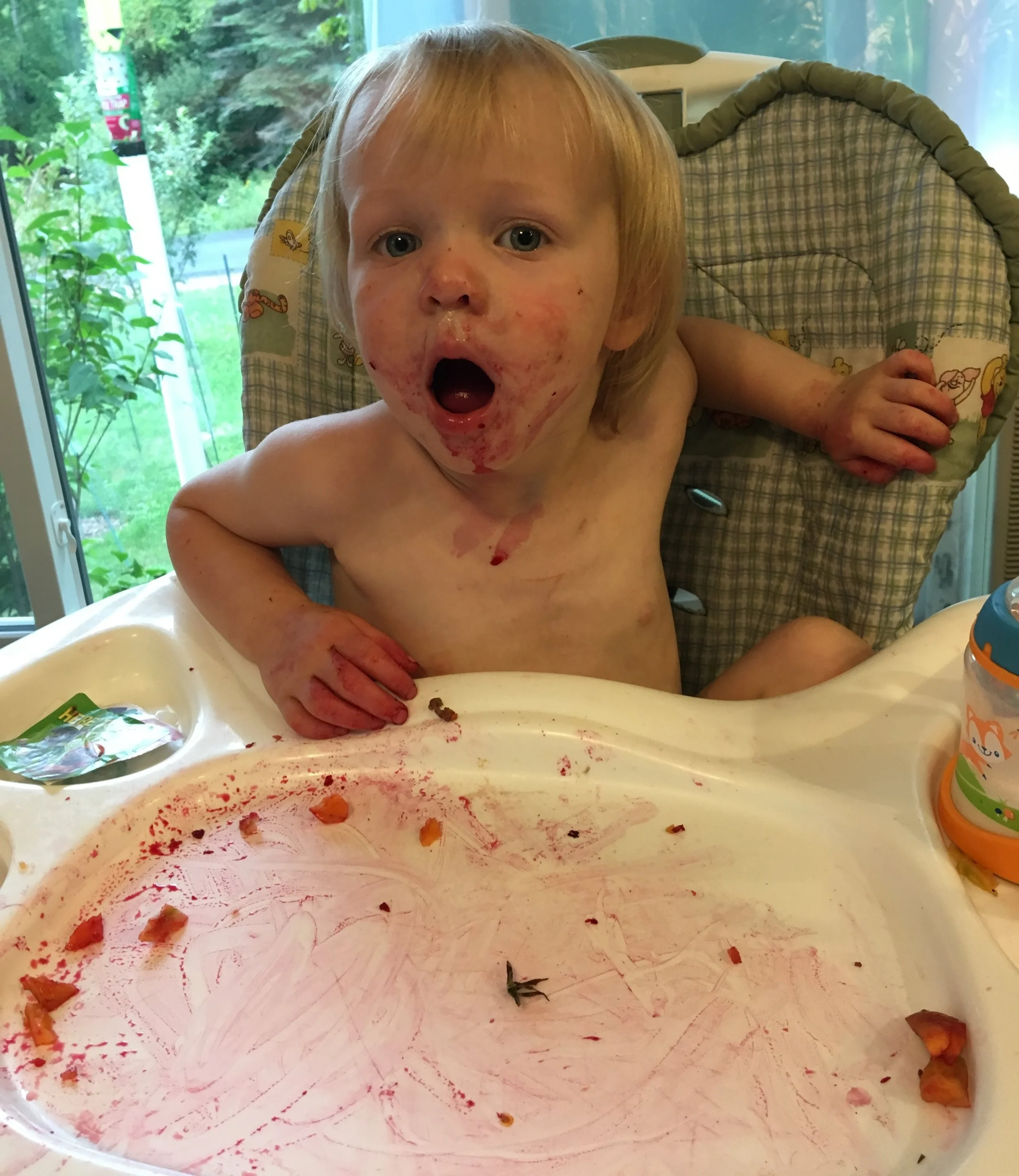 No, this is not Hannibal Lecter, but a happy (and messy) child after eating beets.