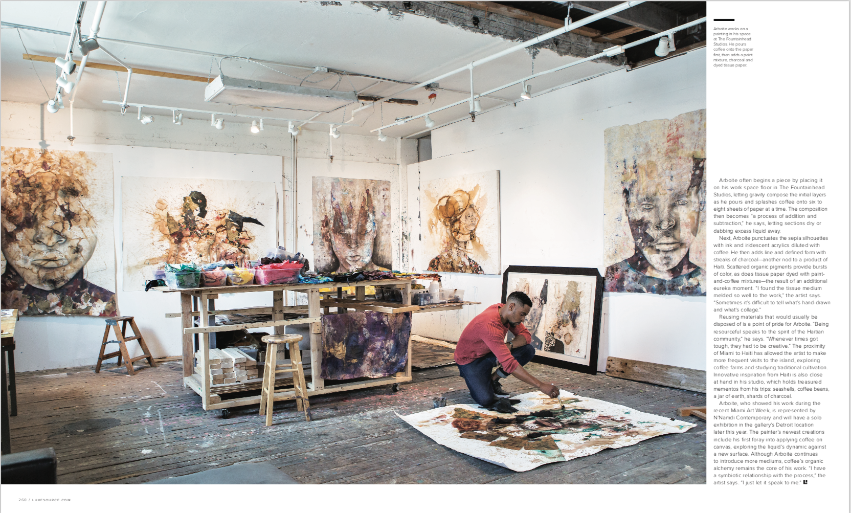 Luxe magazine spread featuring artist, Stephen Arboite, working in his studio, surrounded by his paintings