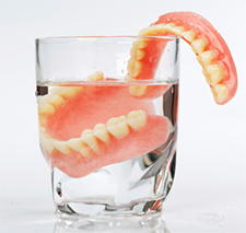 Decisions, Decisions: Dentures or Implants?