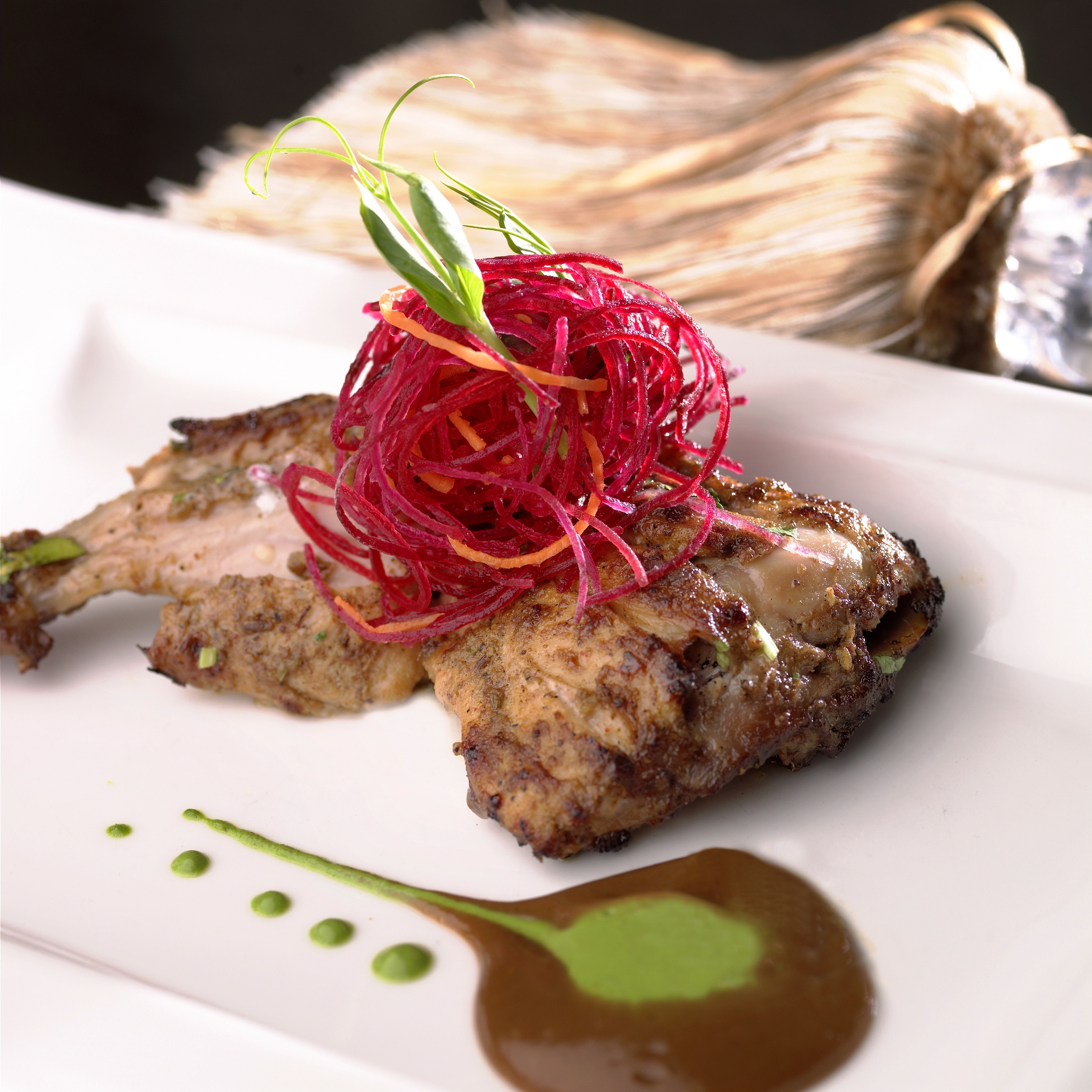 Corn-fed chicken thigh tikka marinated in roasted cumin and chilli yogurt, served with coriander and basil sauce - resized
