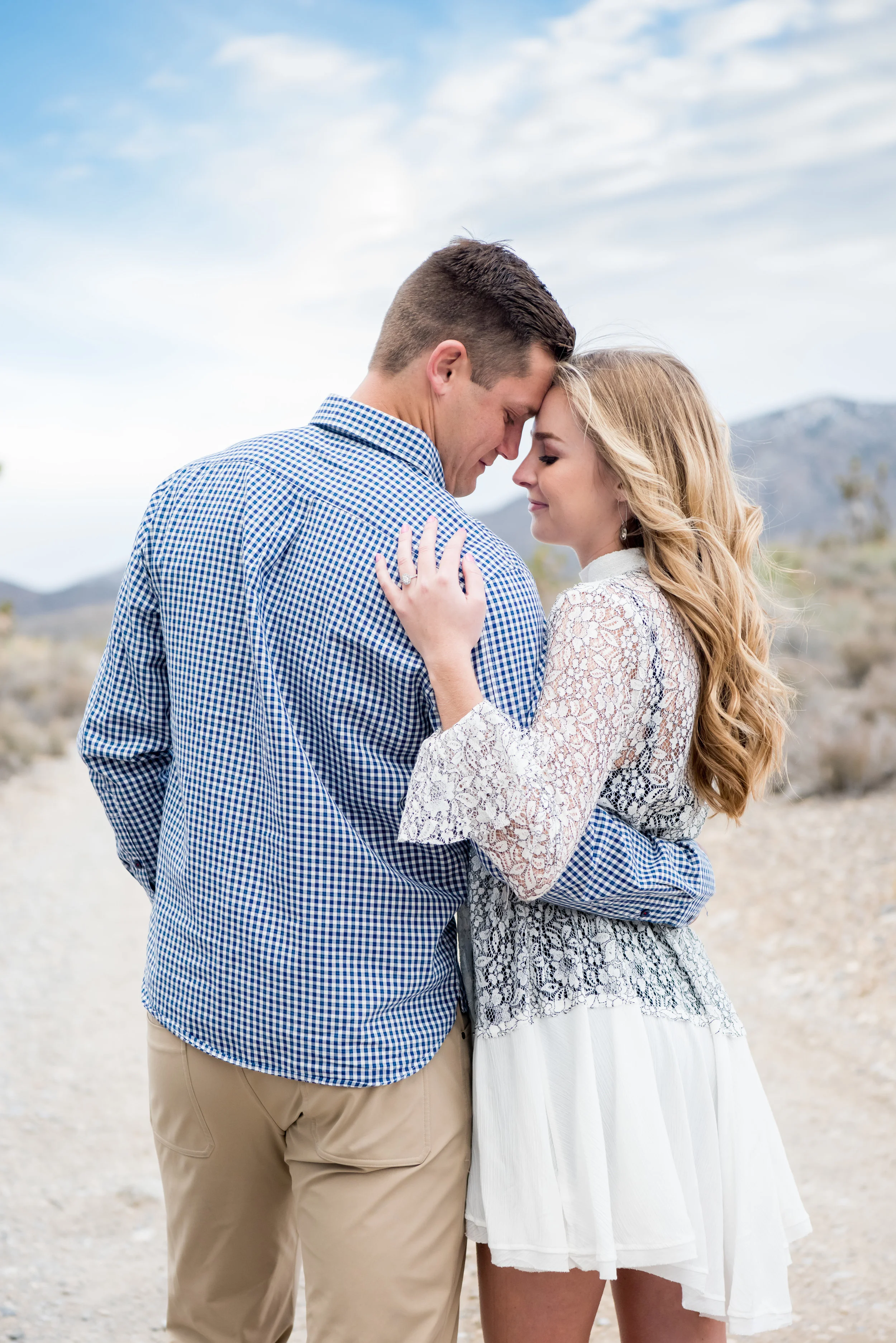 engagement session in Las Vegas in the desert and snowy mountains
