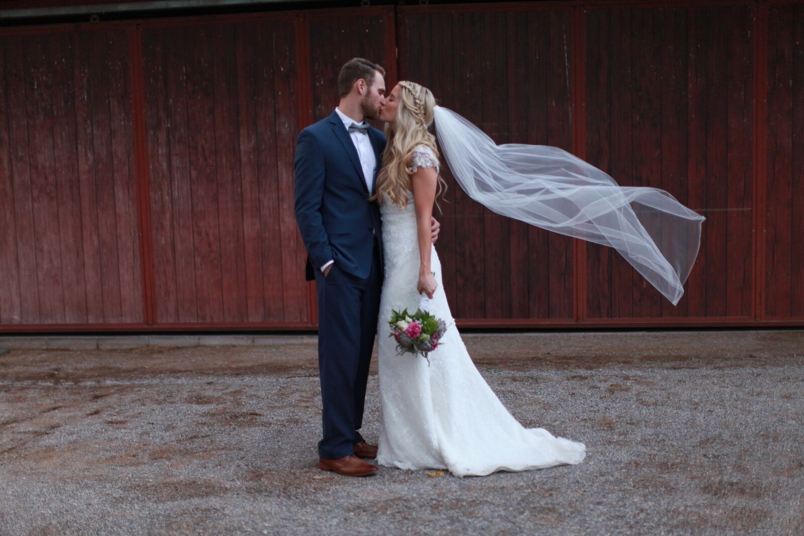 bride and groom on their wedding day. veil shot