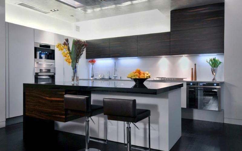 Kitchen with marble kitchen island and chairs