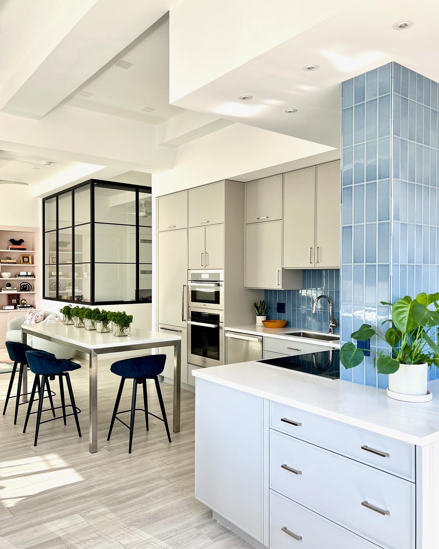 This stunning contemporary kitchen draws from many elements to create a sophisticated, unified look. What&rsquo;s your favorite part? 
Kitchen designer, John Starck 
Interior designer, Marc J. Hampton