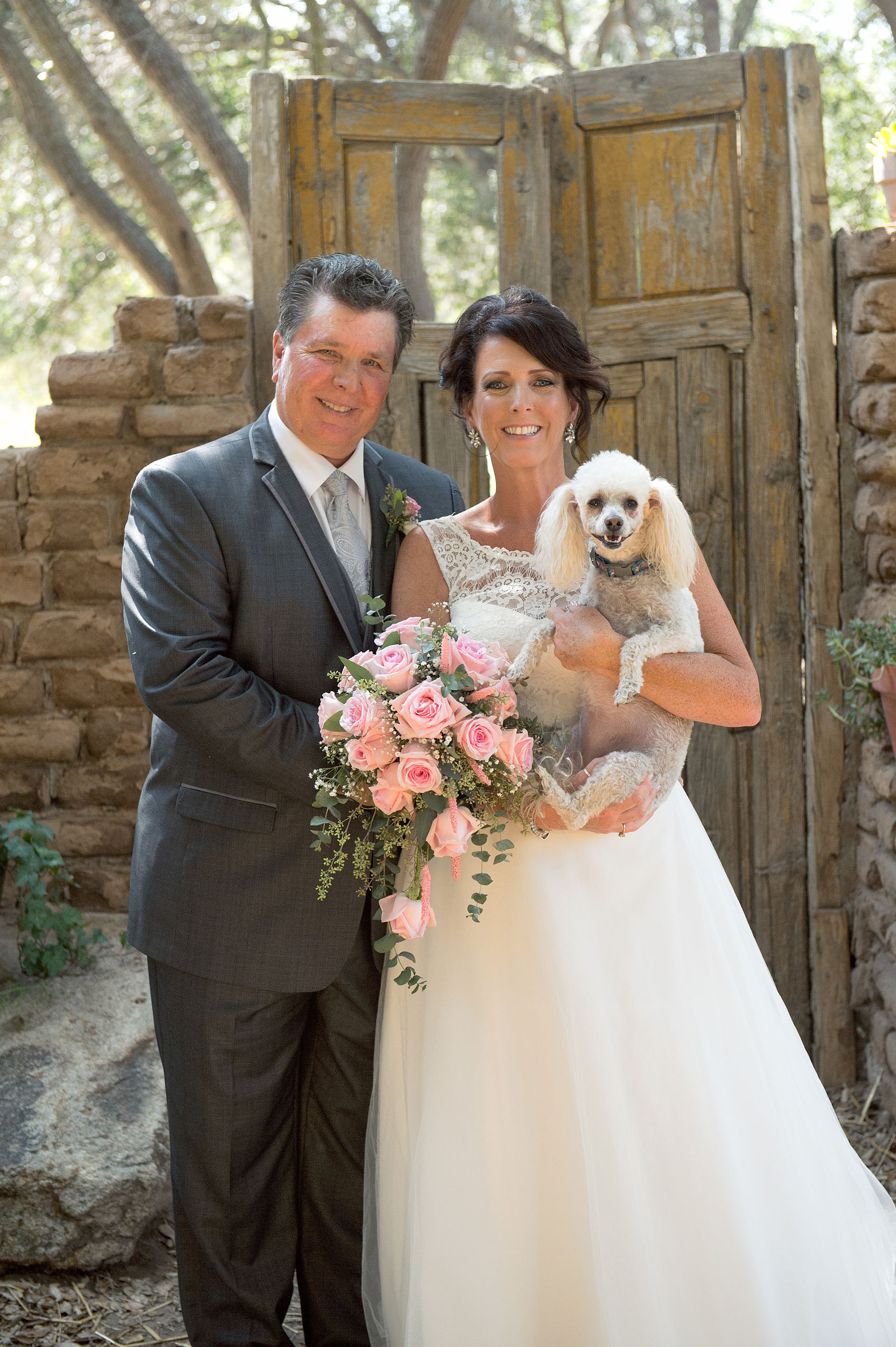 Bride, groom and pet dog portrait at Myrtle Creek Botanical Gardens & Nursery in Fallbrook.