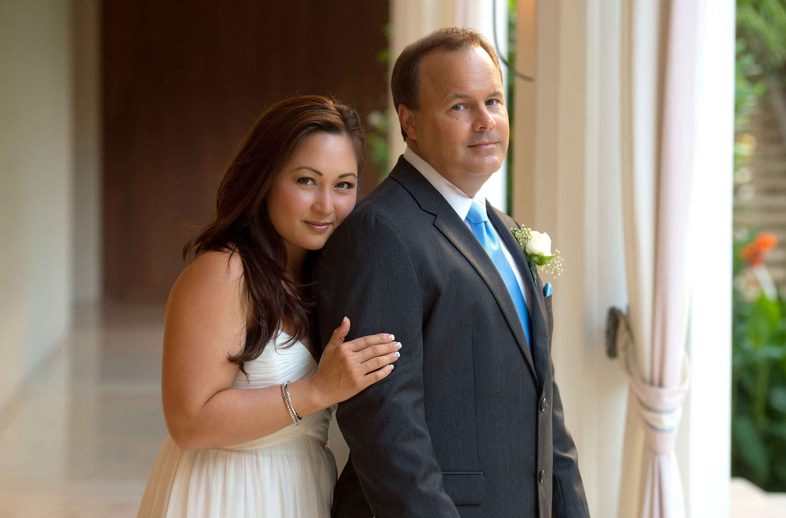 Bride and groom portrait at the Halekulani Hotel in Honolulu.