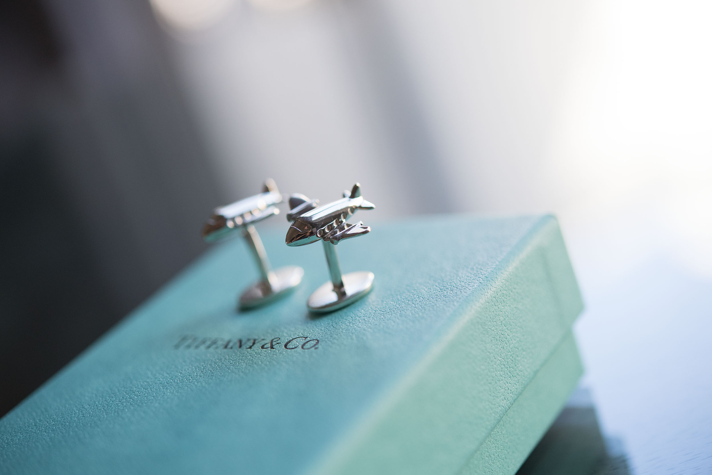 A pair of airplane aviation cufflinks from Tiffany & Co. at Santa Catalina Island.