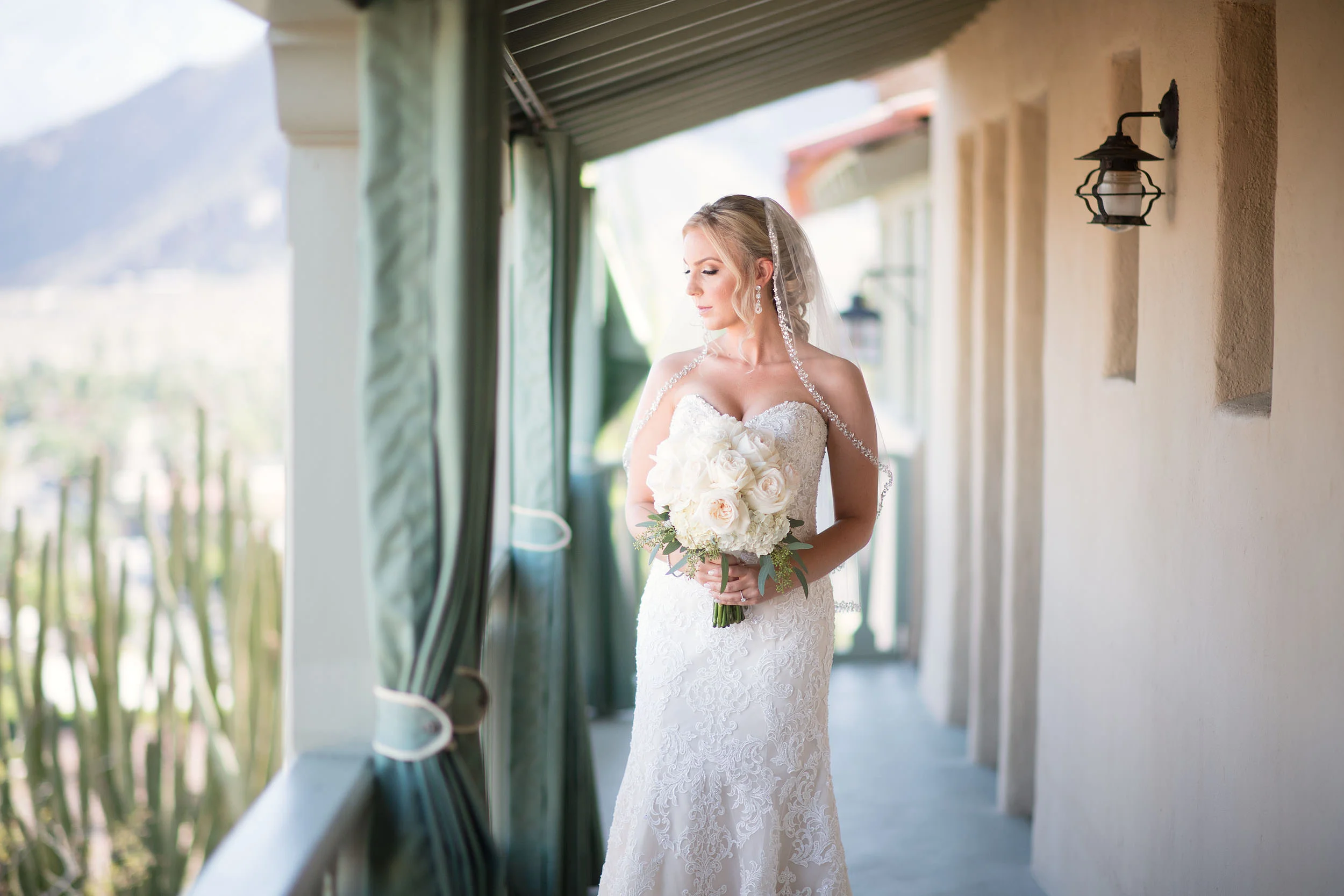Bride with bouquet at O'Donnell House in Palm Springs.