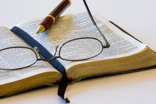 a bible pen and glasses.jpg