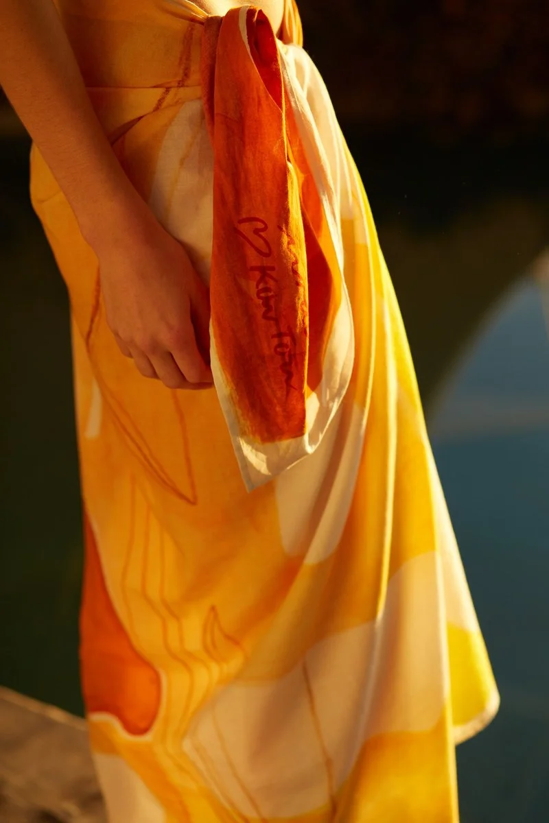 kowtow-x-mirador-sarong_01_sunrise_lookbook_94794877-cd6b-4c75-89f4-4fd58c5d239d_800x1200.jpg