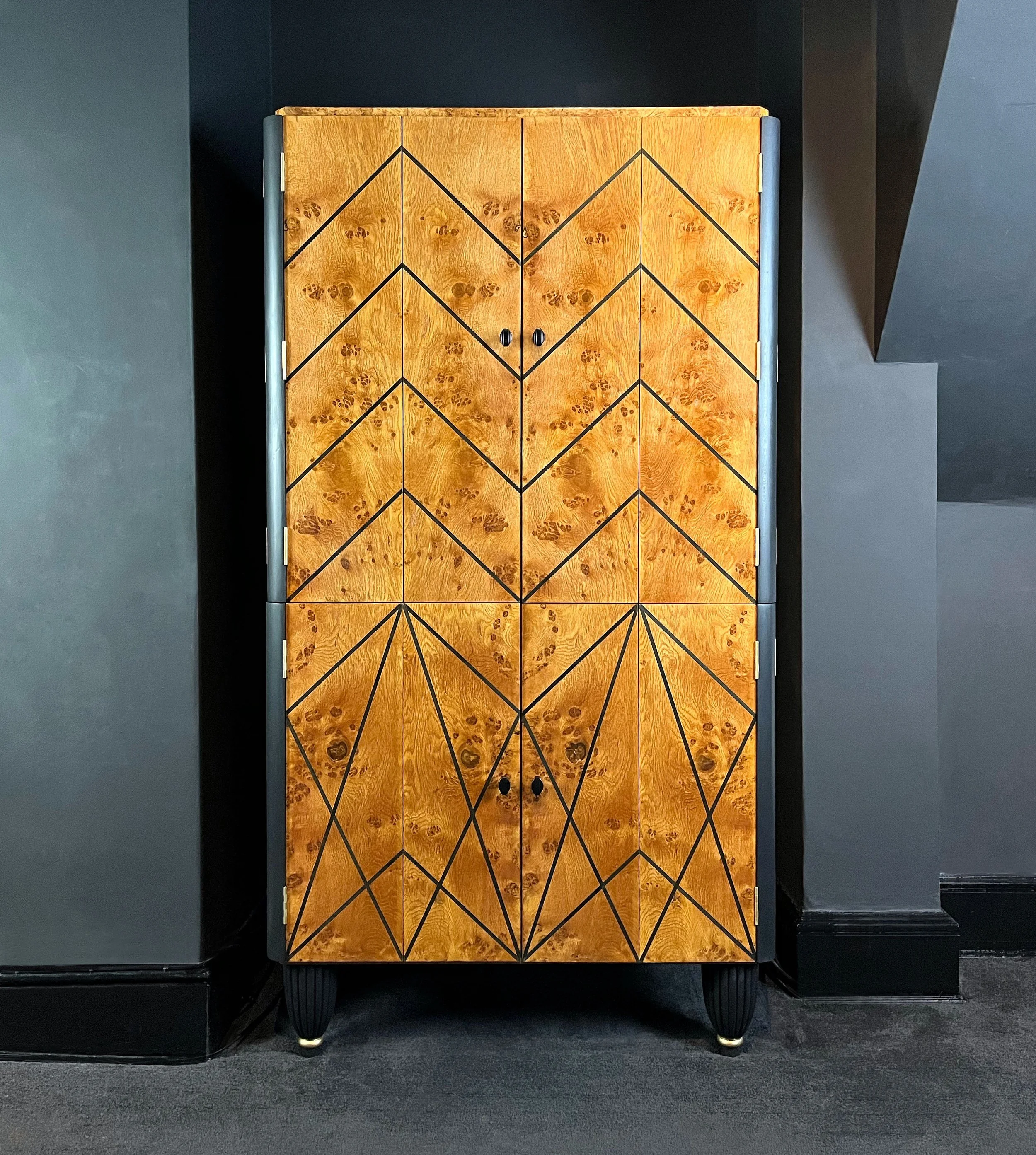    Project No. EP110 - ‘Kaspar’    Re-designed Art Deco coffee &amp; cocktail cabinet, originally from The Savoy Hotel in London, with onyx-effect backlighting, bakelite-style handles and geometric chevron door design. 