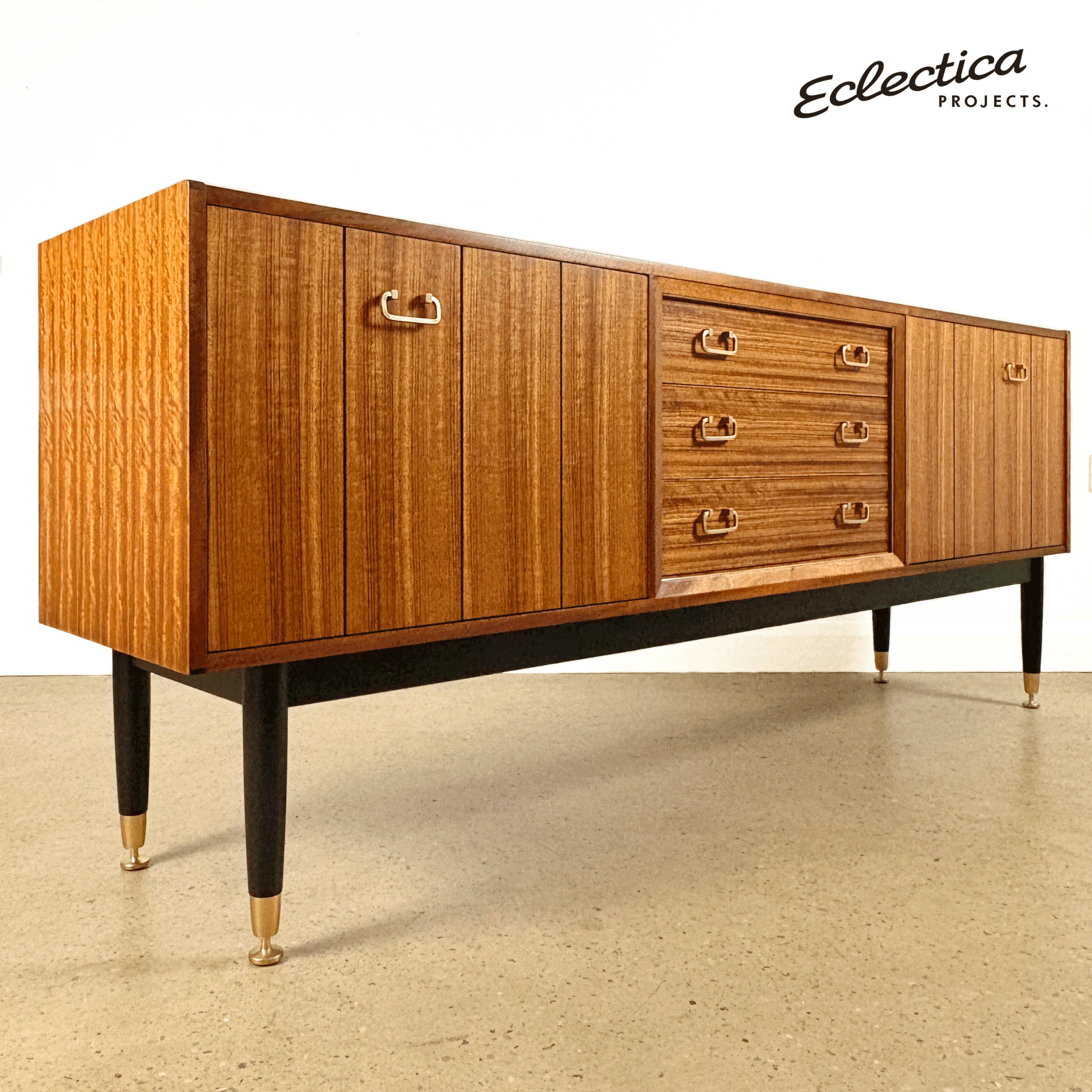 vintage_1960s_G_Plan_sideaboard_with_cocktail_cabinet_by_Eclectica_Projects.gif