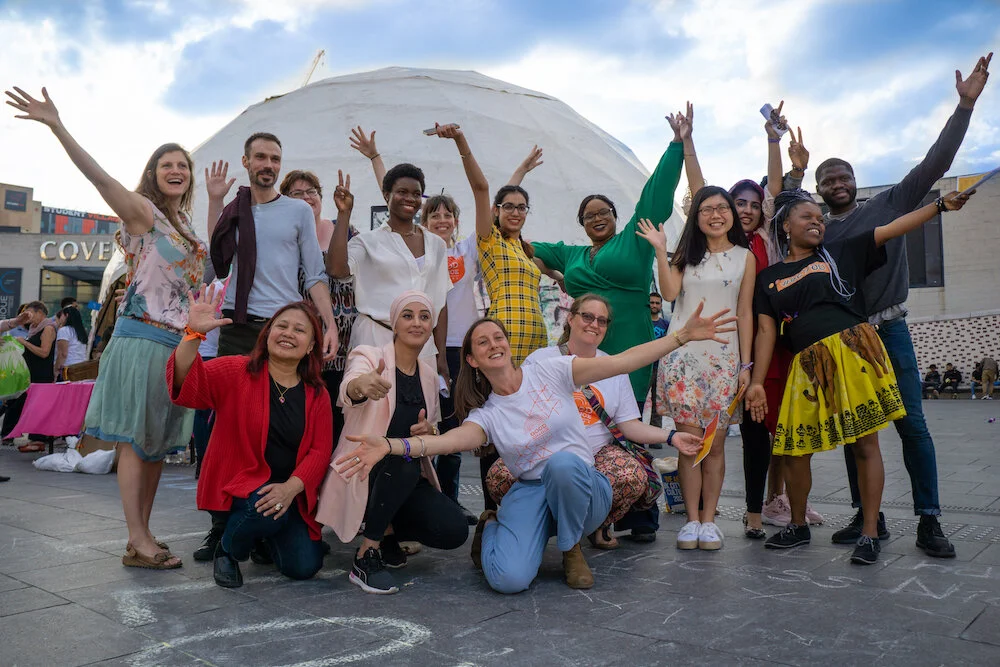 Tada! Our Change the Word Coventry collective after their premiere poetry performance in the Dome