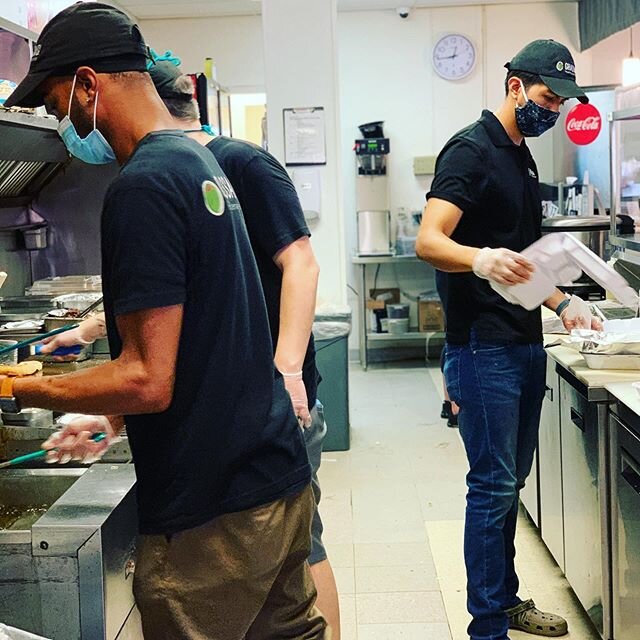 Our amazing staff cooking up fresh food for you!